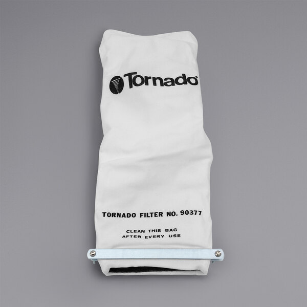 A white Tornado filter bag with black text.