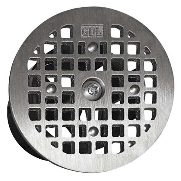 A circular metal Guardian Drain Lock with a square grid on top.