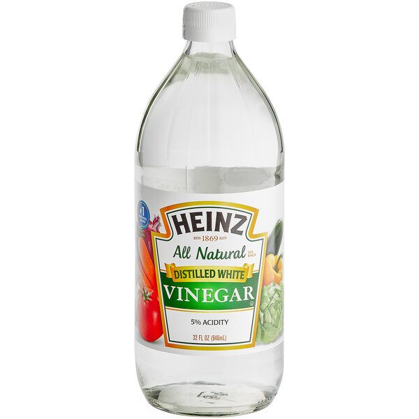 A bottle of Heinz Distilled White Vinegar with a white label.
