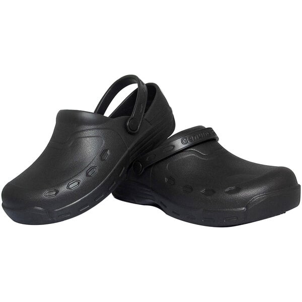 A pair of black Genuine Grip men's open back clogs with straps on the side.