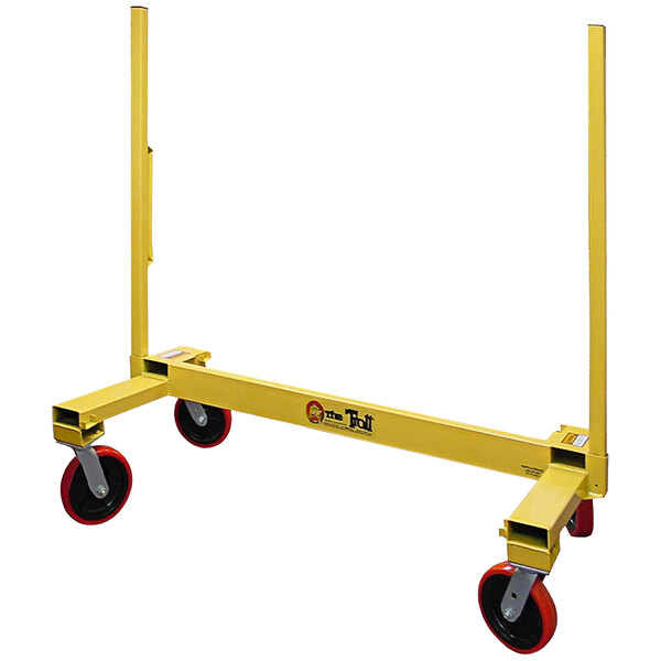 A yellow metal cart with red wheels.