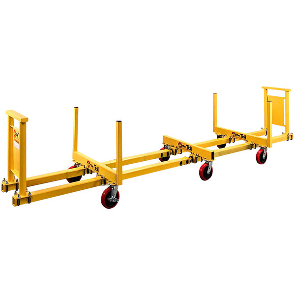 A yellow metal cart with red wheels.