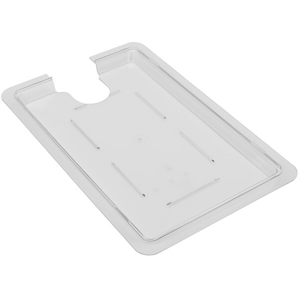 A clear plastic tray with a hole in it.