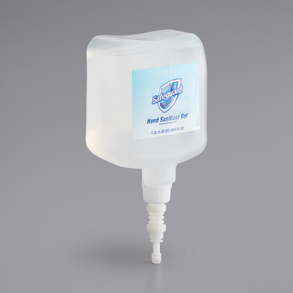 A plastic bottle of Safeguard gel hand sanitizer with a logo.