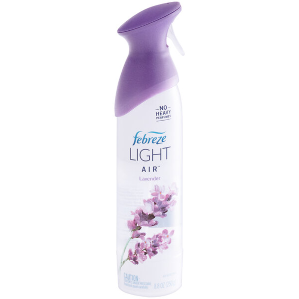 A close-up of a Febreze Air Light lavender spray bottle with a purple cap.