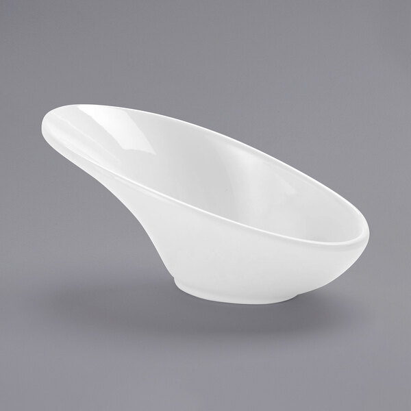 An American Metalcraft white melamine bowl with a curved edge.