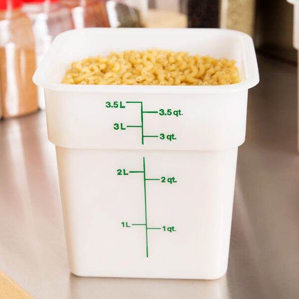A white Cambro CamSquares food storage container filled with pasta.