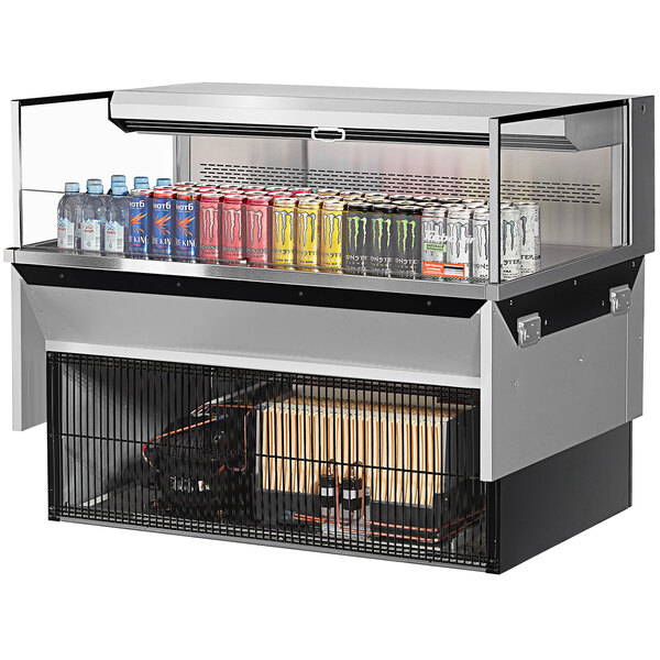 A Turbo Air stainless steel drop-in refrigerated display case filled with drinks on a counter.