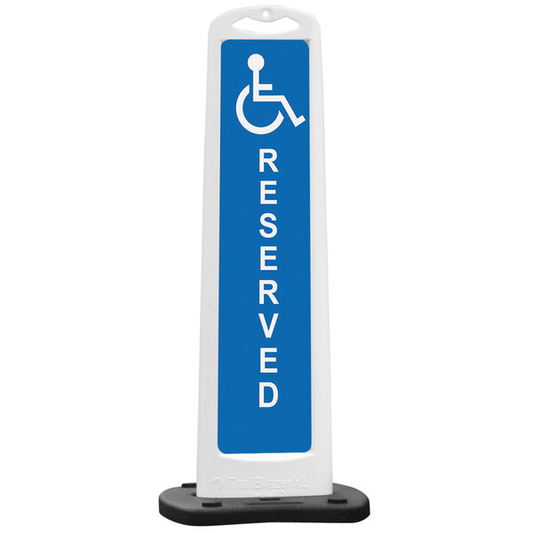 A blue sign with white text that says "Handicap Reserved Parking"