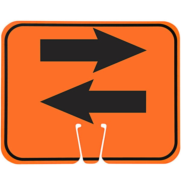 An orange sign with black arrows pointing in opposite directions.
