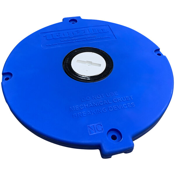 A blue circular Thermaco Trapzilla top cover with a white circle.