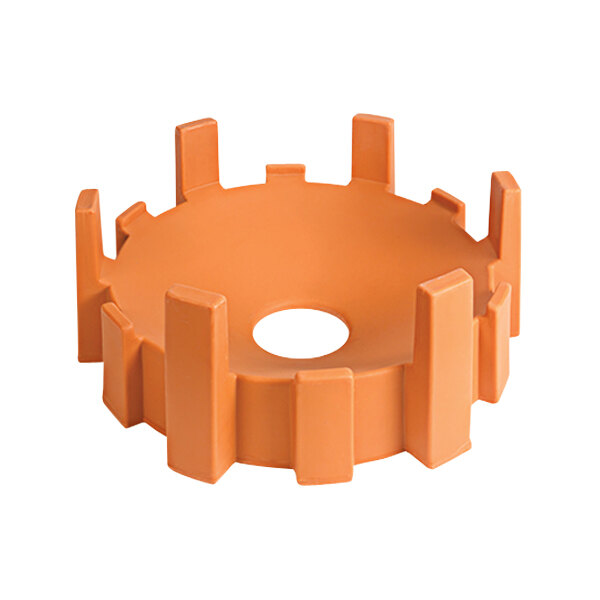 An orange plastic support stand with a white circle in the center.