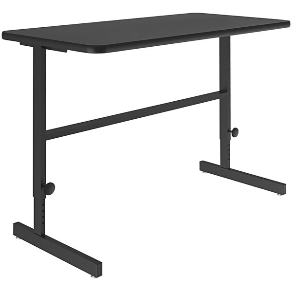 A black rectangular Correll standing height work station with black legs.