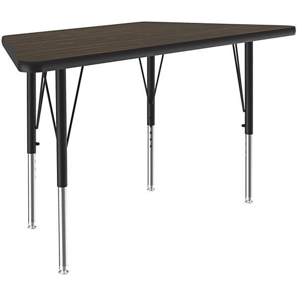 A close up of a Correll trapezoid activity table with black and silver legs.