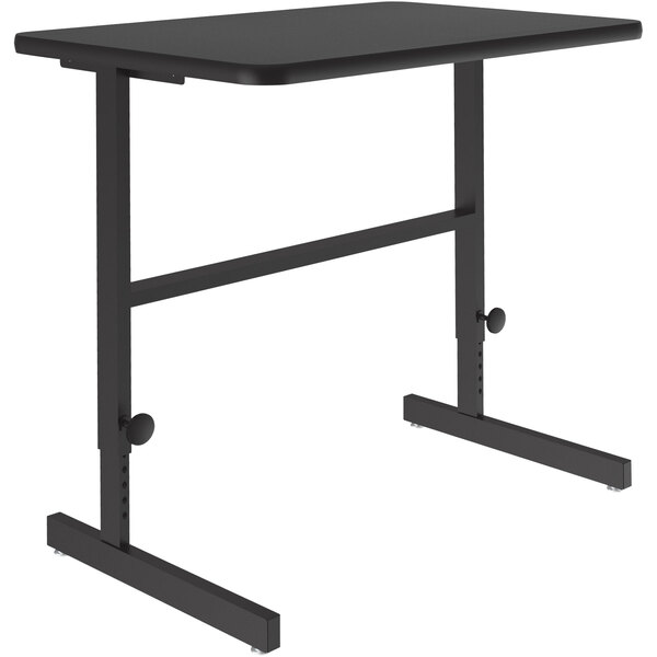 A black rectangular Correll standing height work station with black legs.