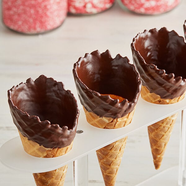 An ice cream cone dipped in Oringer chocolate coating.