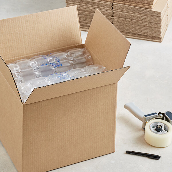 A Lavex cardboard shipping box filled with clear plastic bottles.