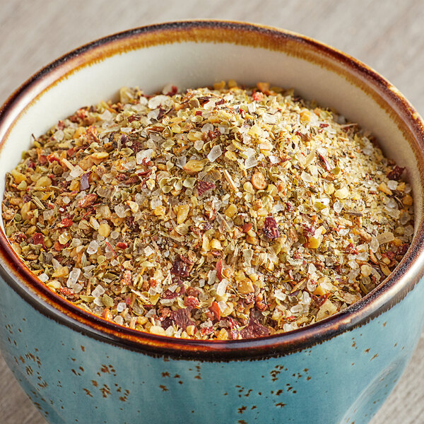 A bowl of McCormick Culinary Mediterranean spiced sea salt on a table.