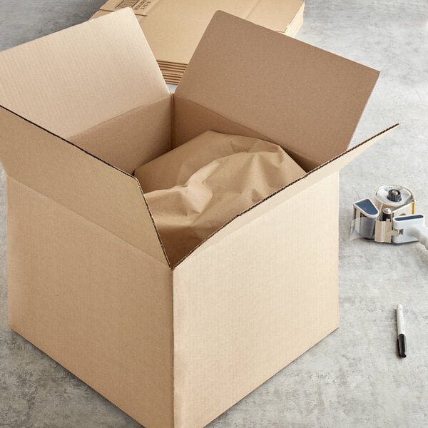 A Lavex cardboard shipping box with crumpled paper inside.