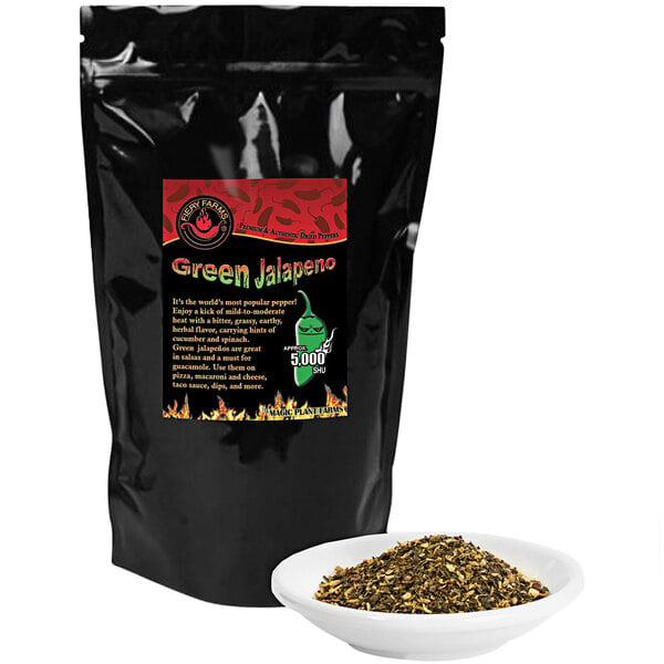 A black bag of Fiery Farms Green Granulated Jalapeno Pepper on a white counter.