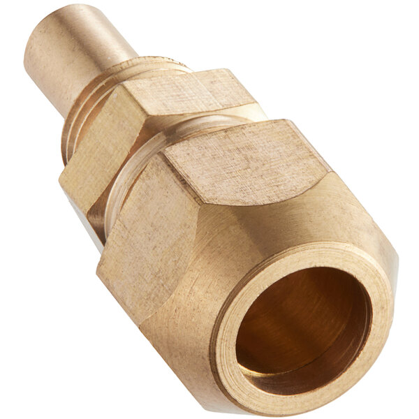 A gold metal nozzle with a threaded hole.