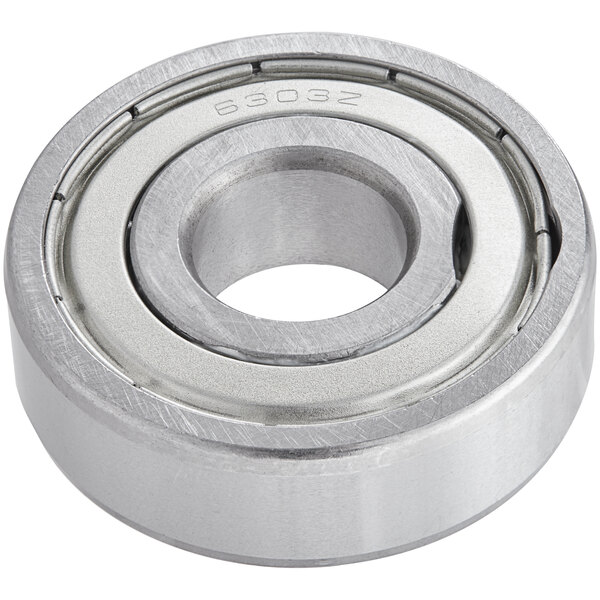 A close-up of a Avantco ball bearing with a stainless steel ring.