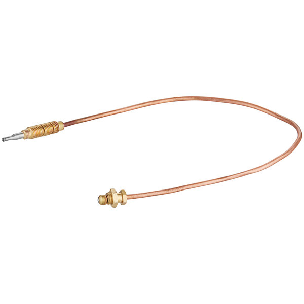 A close-up of a copper thermocouple with a gold connector.