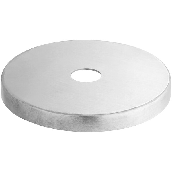 A silver circular bearing cover with a hole in the center.