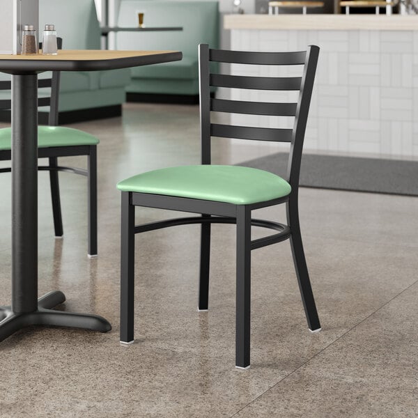 Lancaster Table & Seating Black Finish Ladder Back Chair with 2 1/2" Seafoam Vinyl Padded Seat - Assembled