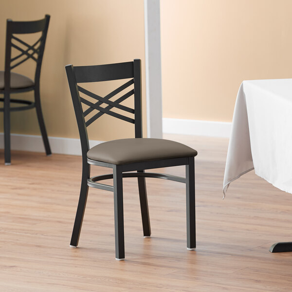 Lancaster Table & Seating Black Finish Cross Back Chair with 2 1/2" Taupe Vinyl Padded Seat