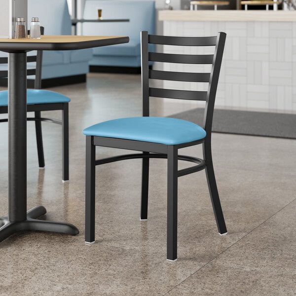 Lancaster Table & Seating Black Finish Ladder Back Chair with 2 1/2" Blue Vinyl Padded Seat - Detached