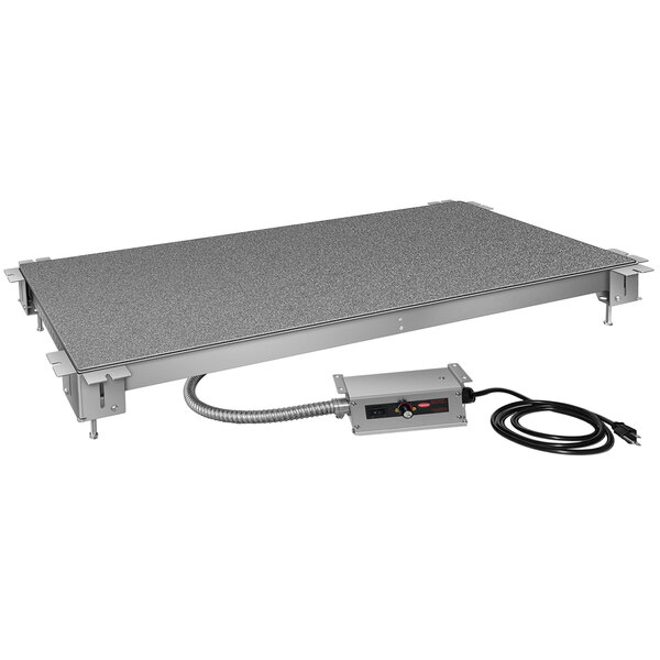 A grey rectangular Hatco heated shelf warmer with a power cord and cable attached.