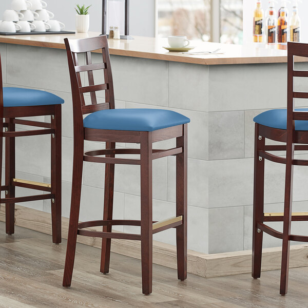 Lancaster Table & Seating Mahogany Finish Wooden Window Back Bar Height Chair with Blue Padded Seat