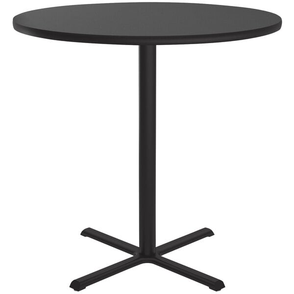 A Correll black granite bar height table with a metal leg.