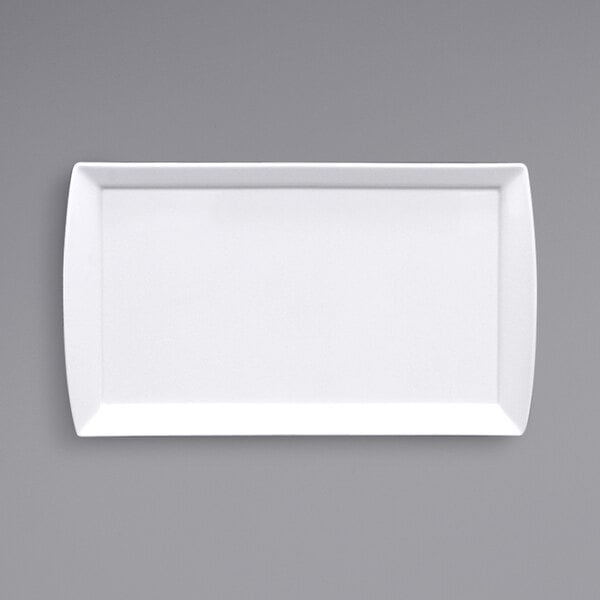 A white rectangular porcelain tray with handles.