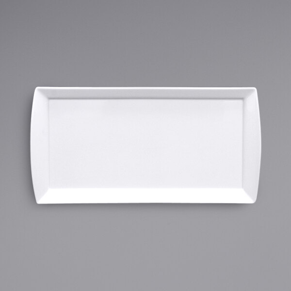 A white rectangular Fortessa Tavola tray with handles on a gray surface.