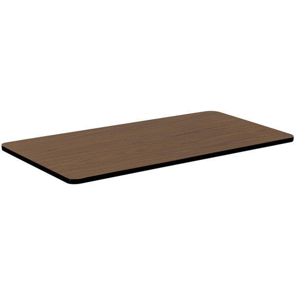 A rectangular wood table top with a walnut finish.