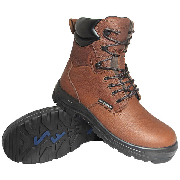 A brown Genuine Grip Poseidon work boot with a black sole.