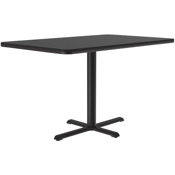 A Correll black rectangular table with a black metal base.