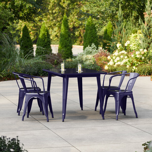 Lancaster Table & Seating Alloy Series 47 1/2" x 29 1/2" Navy Standard Height Outdoor Table with 4 Arm Chairs