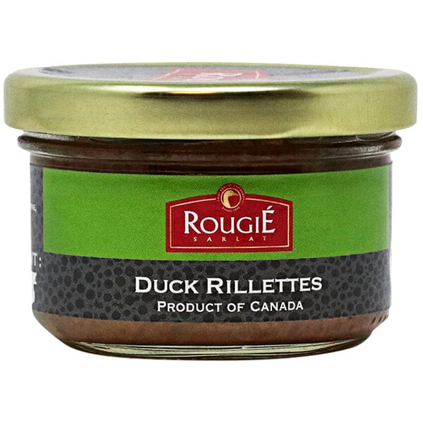 A glass jar of Rougie Duck Rillettes with a green, red, and white label.