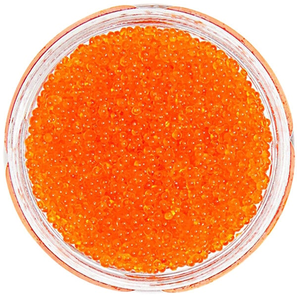 A bowl of Bemka Orange Tobiko, orange caviar with orange balls.