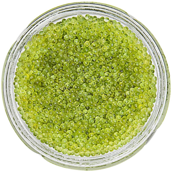 A jar of Bemka Green Tobiko with green spheres inside.
