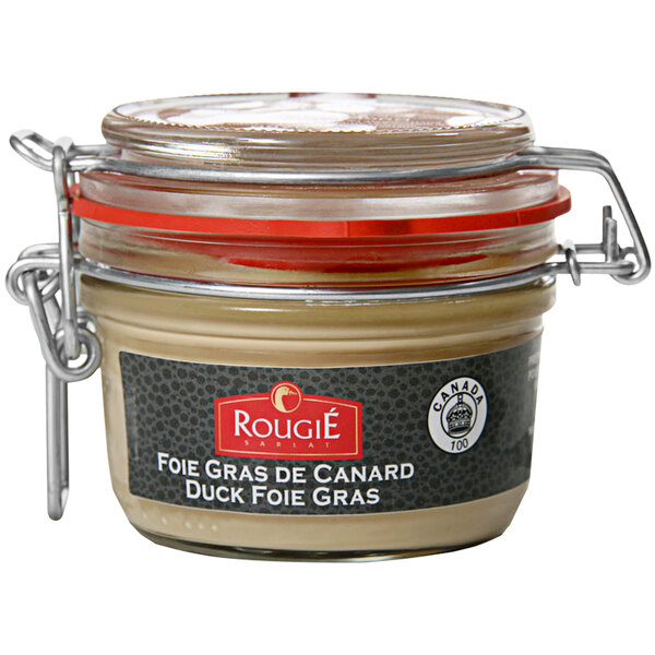 A jar of Rougie Whole Armagnac Foie Gras with a red lid and label.