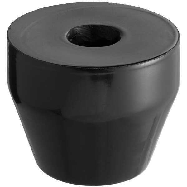 A black plastic cylinder with a hole.