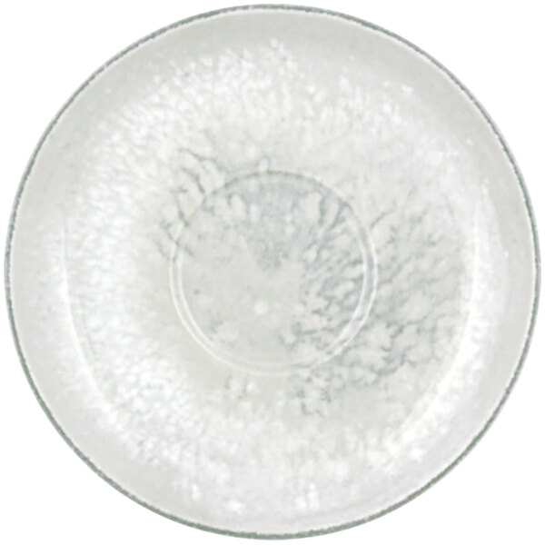 A white plate with a circular pattern in the middle.