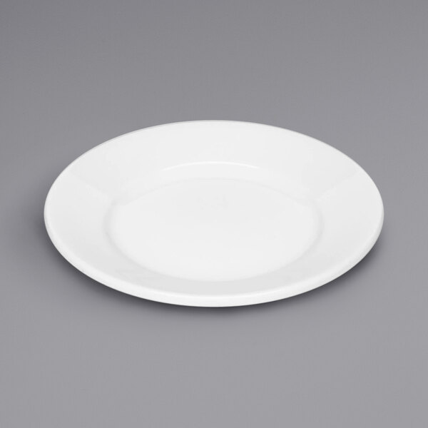A Bauscher bright white porcelain plate with a rim.