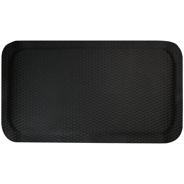 A black rectangular mat with a textured surface.
