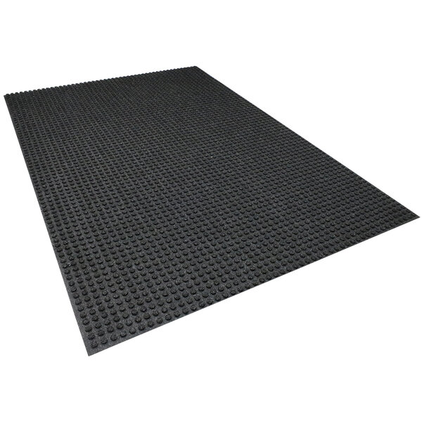 A black rubber mat with small dots.