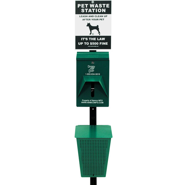 A green and black Namco pet waste station with a sign that says "Dog Waste" and a dog silhouette.